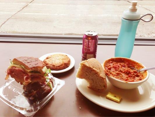 Turkey chili with wheat bread, a ham sandwich, a peanut butter cookie (with sugar), and a Cherry Coke. Available affordably!