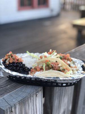 2 Taco Entree with black beans and white rice.