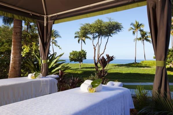 Oceanview Cabanas let you relax outside in the tropical breezes