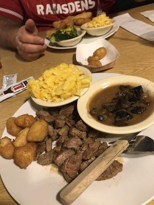 My steak tips, gravy, Mac and cheese and more hush puppies. A really good meal...