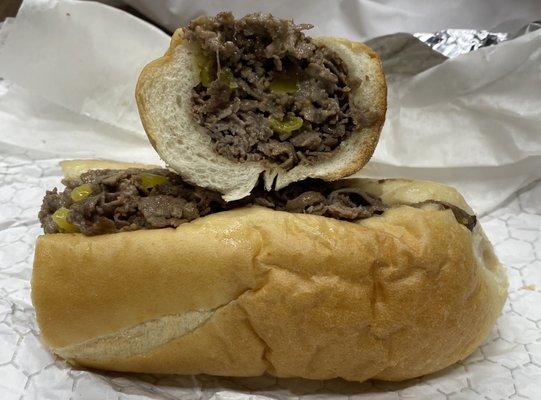 Cheesesteak - hot peppers .... Fresh roll, finely chopped, good cheese to meat balance. Little pricey, but a good sandwich.