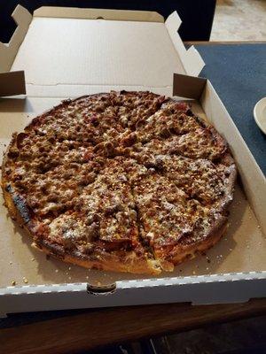 Large Meat Muncher in a 16" box and beyond burnt.  Toppings were only 4 or 5 pieces of pepperoni ringing the top and sausage.