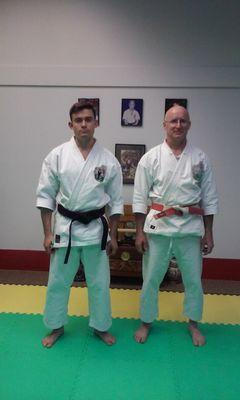 Evan Varney and me after his black belt test.