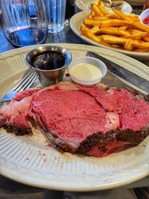 Oh so good Roast Prime Rib of Beef Entree with fries and a glass of Cabernet. Really good dinner.