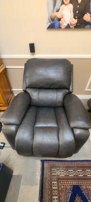 Re Upholstered recliner.