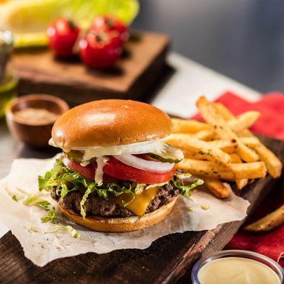 The Original Burger: Grilled medium-well. Lettuce, tomato, pickles and onions. Served with fries.