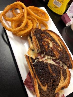 Reuben sandwich and onion rings