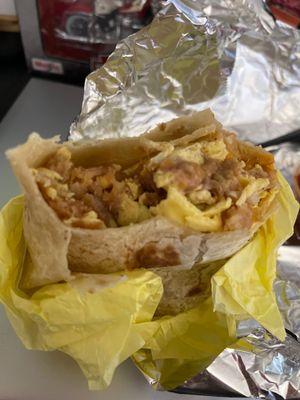 Breakfast burrito with fry's. I was hungry and you can't tell from all I ate already but this burrito was huge.