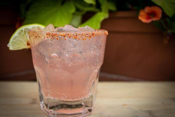 Smokey Paloma - Bozal Mezcal, Giffard Pamplemousse, Agave, Grapefruit Soda, garnished with Tajin rim