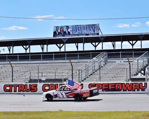 Our Lowman Law billboard at the Citrus County Speedway. Inverness, Florida.