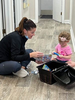 Our assistant playing with one of our patients