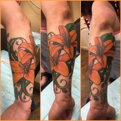 Tiger lilies done by Kimberly. She's awesome! Absolutely in love with my tattoo. I'll be back to see her for more!