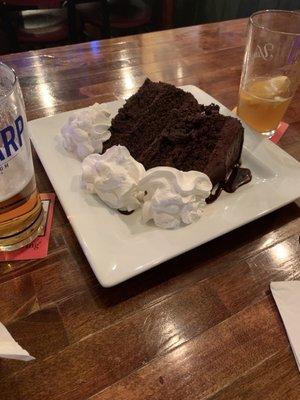 Glasses in picture for scale.  The chocolate cake is huge.