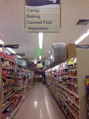 The aisles are clean, tidy, and have good signage.