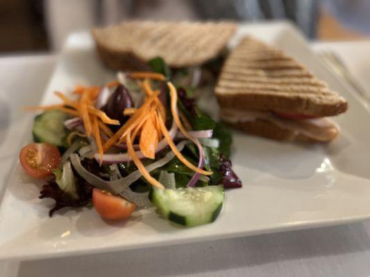 Side salad, with a main of Italian turkey panini