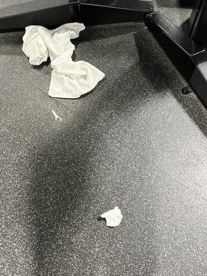 A dirty workout towel, FLOSS, and a dirty tissue