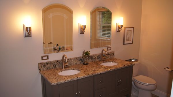 Bathroom renovation. Granite was a remnant which helped color scheme. Benjamin Moore Lancaster Gray vanity color. Recessed mirrors.