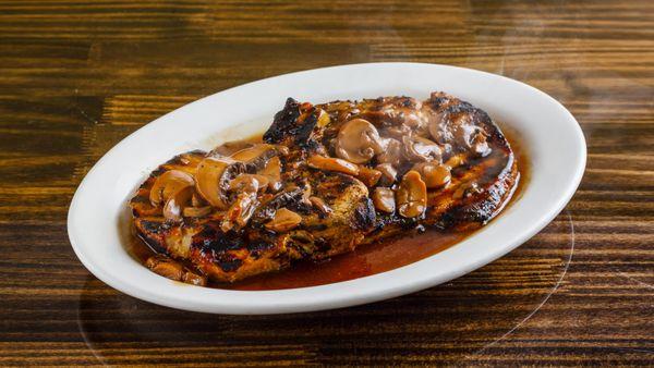 Grilled Pork Chop in mushroom sauce / Chuleta a la parrilla en salsa zetta