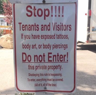 Tattoos and piercings prohibited