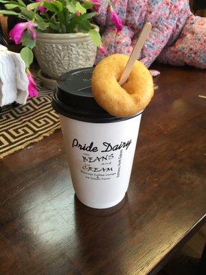 Delicious coffee with a side of donut !