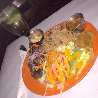 Fried tassot with rice and beans and salad