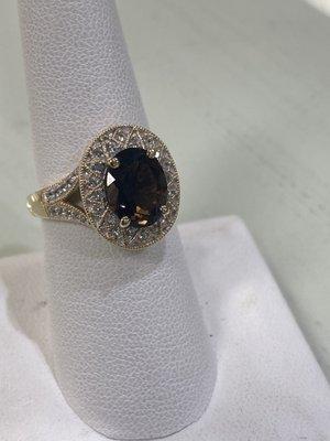 Smoky topaz with white sapphires!