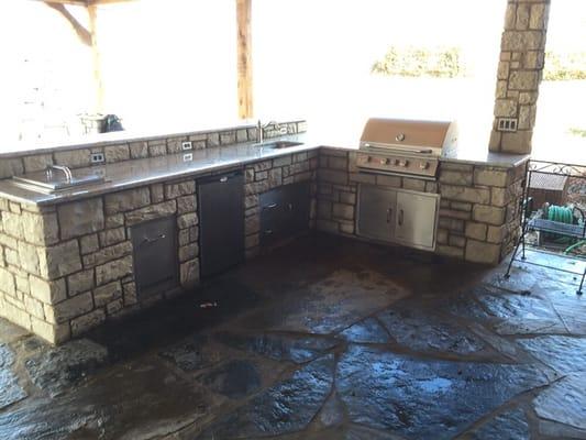 Outdoor kitchen, custom granite counter tops, flagstone patio, lifetime appliances.