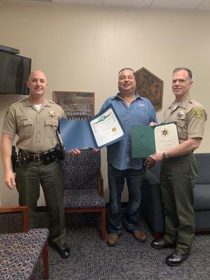 Today, Captain Diez and Lieutenant Loughridge provided Neil Salem, owner of "Canyon Muffler" in Canyon Country, two recognition awards