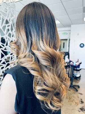 Balayage dark hair to blonde