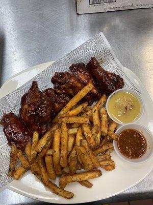 J.w wings with mango pineapple dipping sauce season fries.hell fire hot sauce