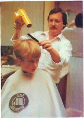 My son getting his first haircut in 1978.