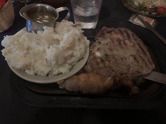 Ribeye with mashed potatoes.