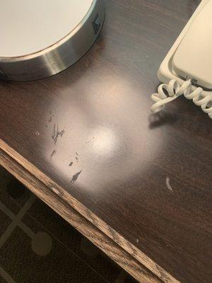 Hard, dry 'gunk' on the nightstand