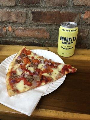 Sausage peppers and onion pizza with the local lemonade.