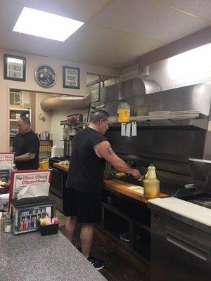 Choo Choo Charlie cooking up Breakfast Our butts on the old time soda fountain stools.