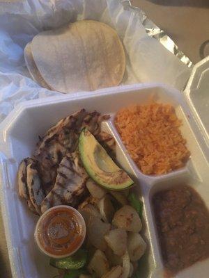 $12 grilled chicken plate. Tiny amounts of rice and beans.