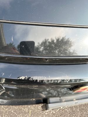 Damage that was caused when they picked up my car.