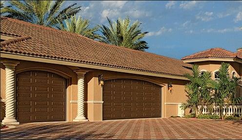 Beautiful short panel custom wood finish garage door