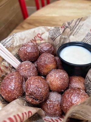 Donut holes with a glazed dipping sauce made with unsweet tea