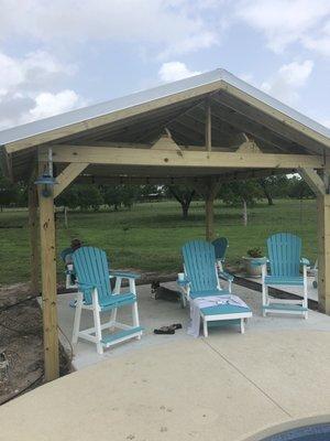 Pool furniture under pergola