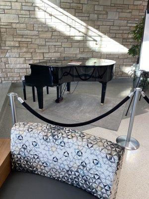 The foyer piano.