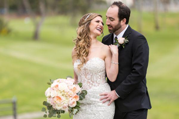 I love how she captured our love while showing off my bouquet, dress and hairpiece!