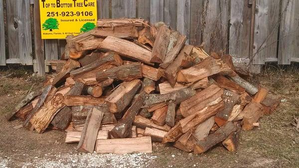 SEASONED FIREWOOD.  WE SELL IN VARIETIES... FROM GREEN MIX, GREEN, SEASONED... (OAK, PECAN, HICKORY, PINE...)