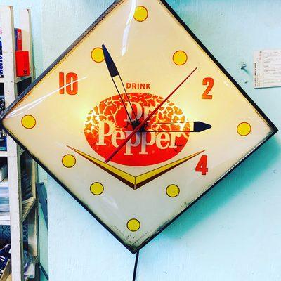 Dr. Pepper clock repaired for customer.