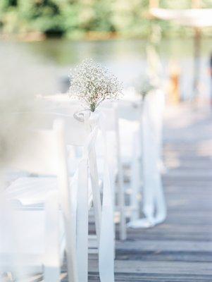 Chair floral accents for wedding aisle. All photos by Elizabeth LaDuca Photography