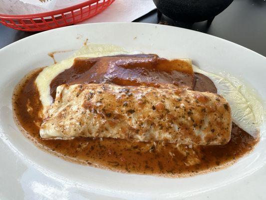 Beef burrito and cheese enchilada.