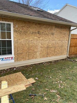 Removed vynl siding installed 7/16 osb sheeting insulated and put vynl siding back