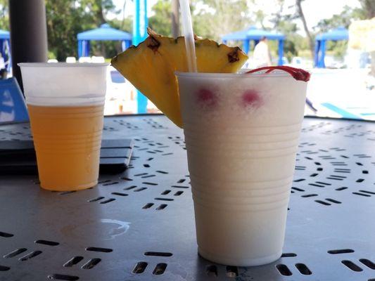 Piña Colada and my Sweetie's Shock Top Amber in the back. Beer is very slim pickins here.