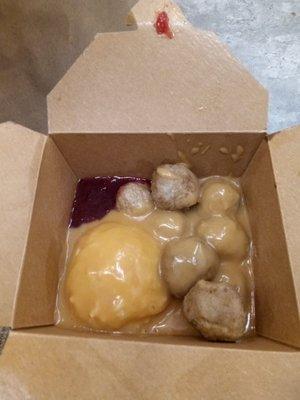 And this is my order of swedish meatballs and looks mashed potatoes and cranberry it's absolutely delicious tasting