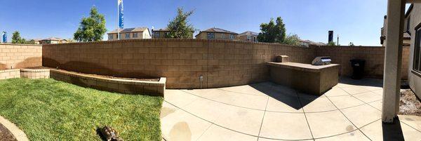 Full backyard planter, barbecue, grass and sprinklers all done by Damien and his crew.